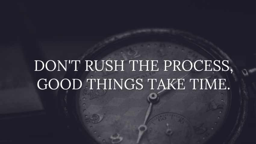 black background with a rusted old analog clock. in white letters the sentence "don't rush the process, good things take time."